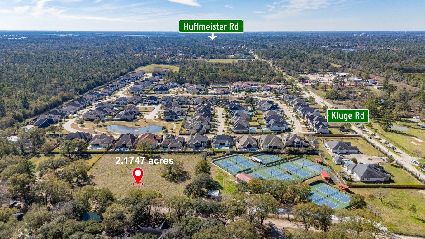 12537 Kluge Road Cypress, TX 77429 - Photo 4 of 12 an aerial view of a houses with a yard