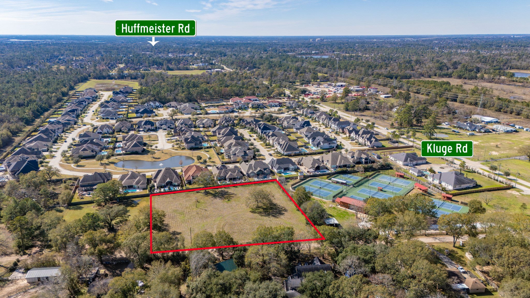 12537 Kluge Road Cypress, TX 77429 - Photo 5 of 12 an aerial view of residential houses with outdoor space