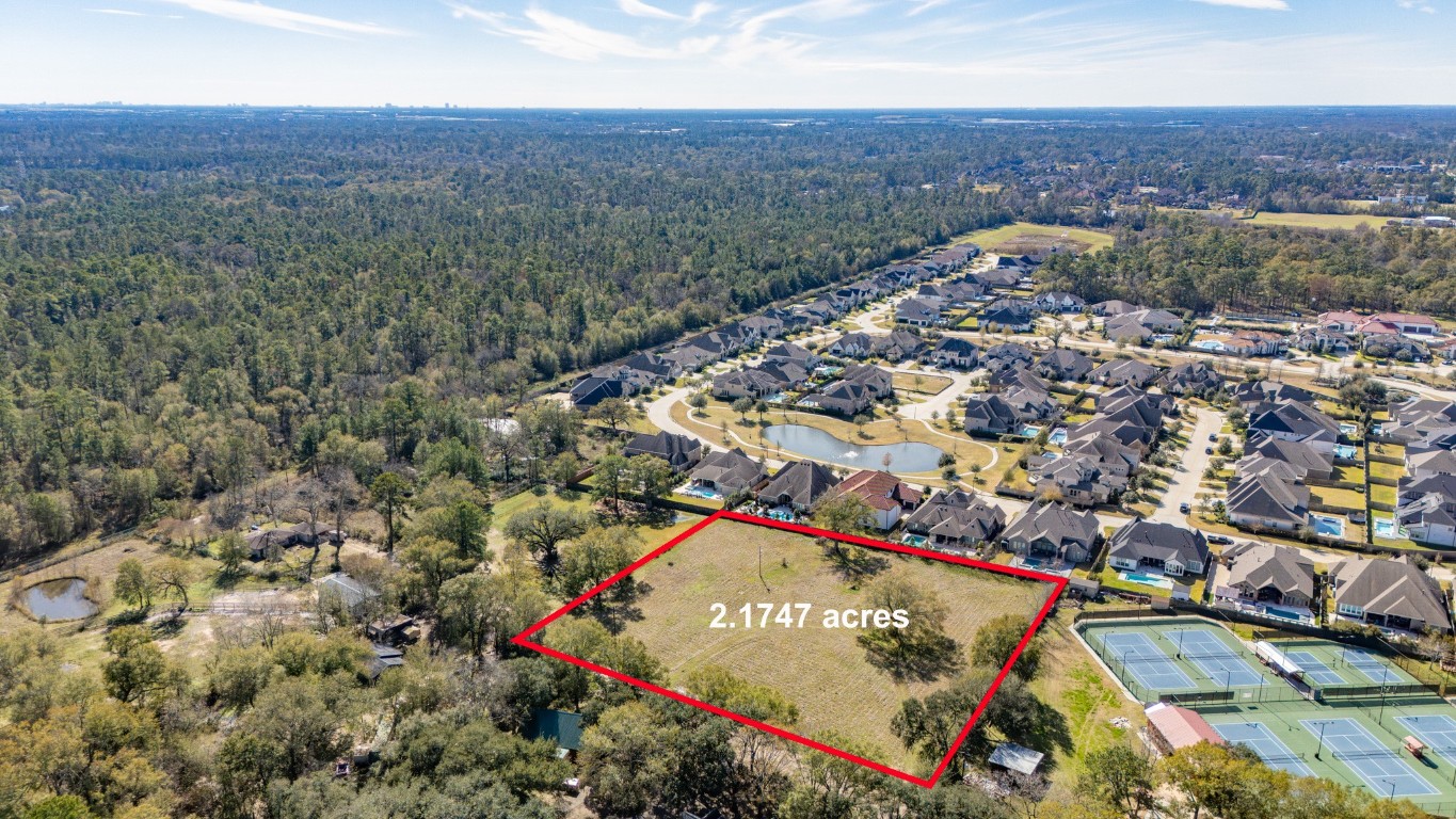 12537 Kluge Road Cypress, TX 77429 - Photo 10 of 12 an aerial view of residential houses with outdoor space and trees