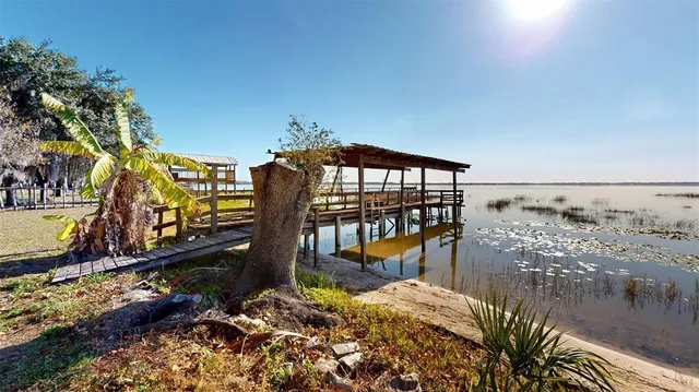 a view of a balcony with a lake view
