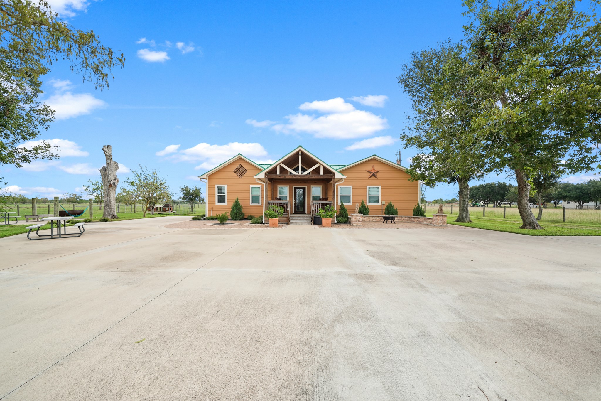 10507 Padon Road Needville, TX 77461 - Photo 11 of 48 a view of houses with city street and trees