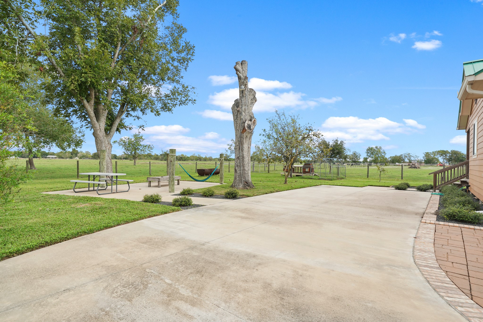 10507 Padon Road Needville, TX 77461 - Photo 15 of 48 a view of a park with big trees and plants
