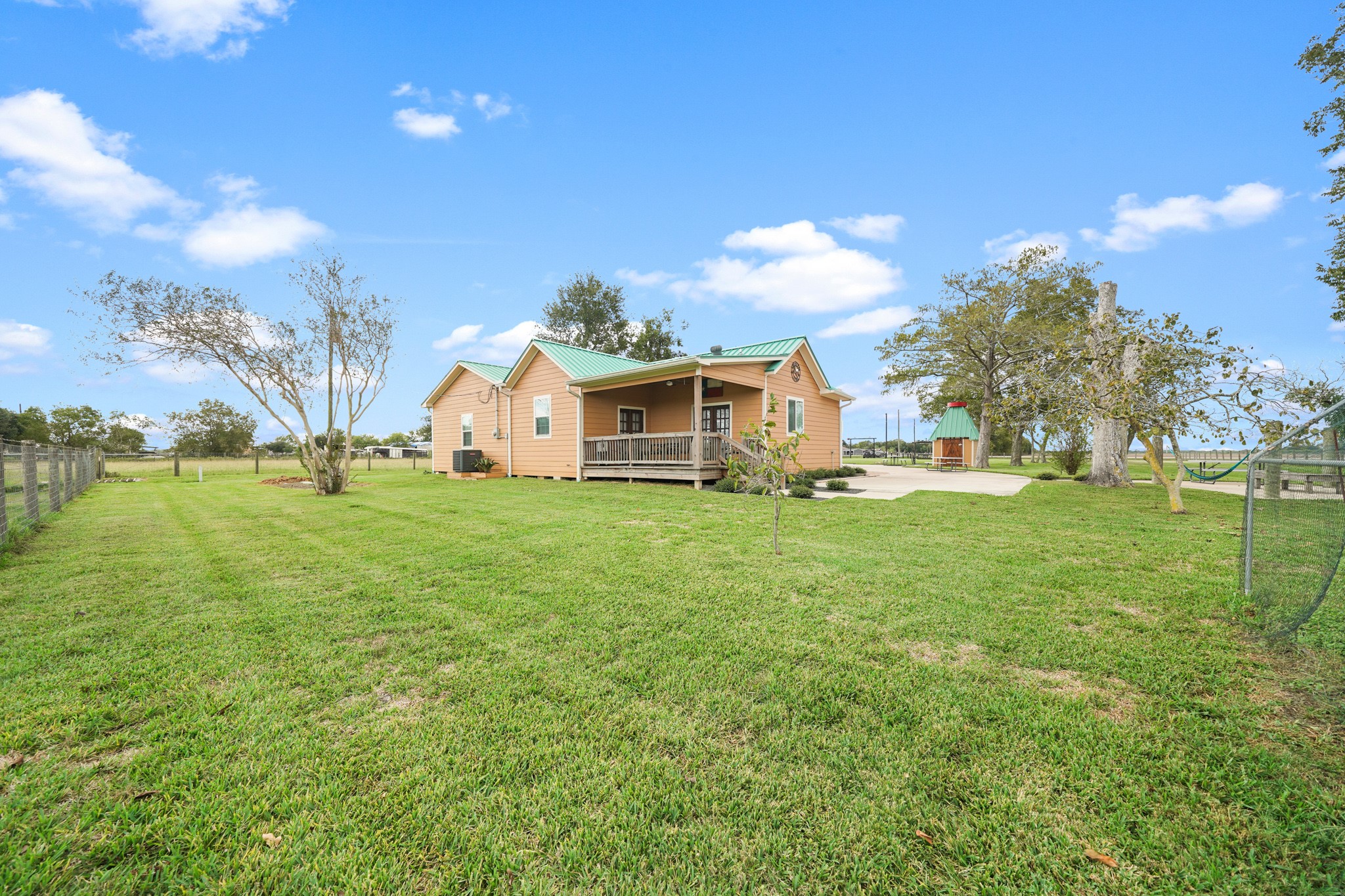 10507 Padon Road Needville, TX 77461 - Photo 17 of 48 a view of a house with a big yard