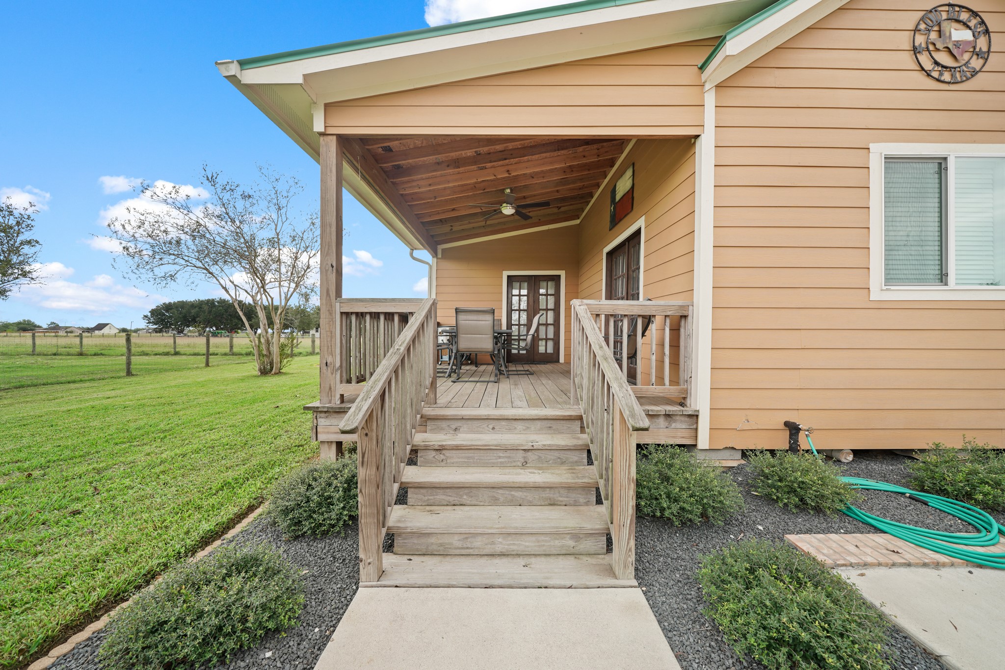 10507 Padon Road Needville, TX 77461 - Photo 18 of 48 a view of a house with a yard