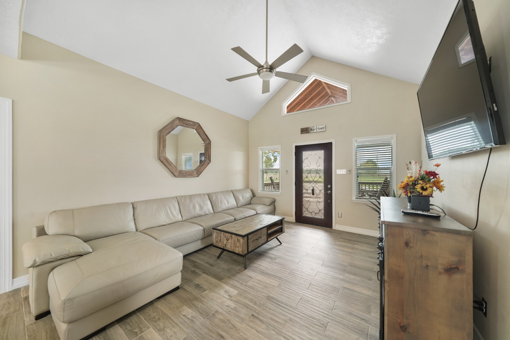 10507 Padon Road Needville, TX 77461 - Photo 23 of 48 a living room with furniture and a flat screen tv