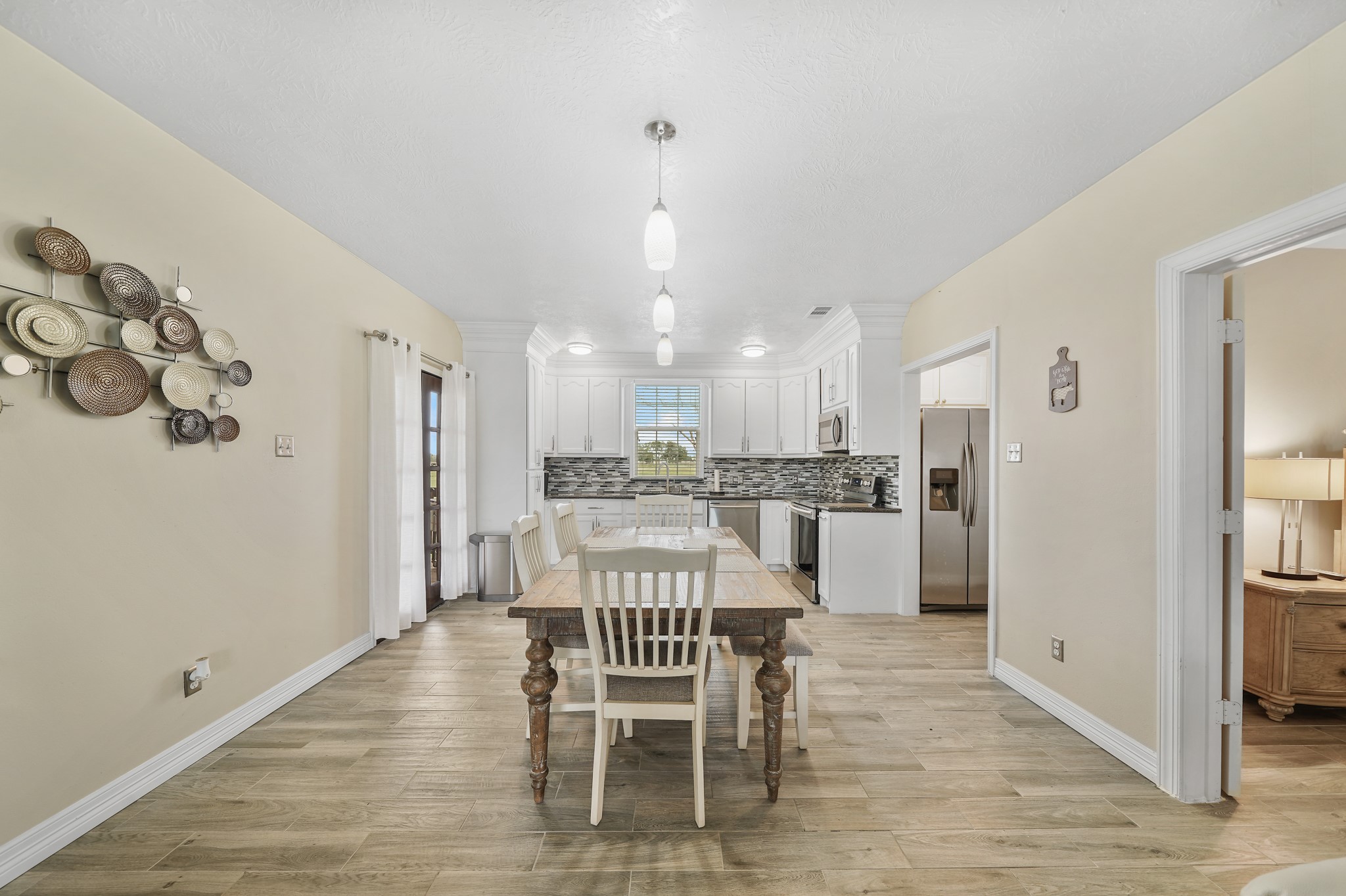 10507 Padon Road Needville, TX 77461 - Photo 26 of 48 a dining room with furniture and window