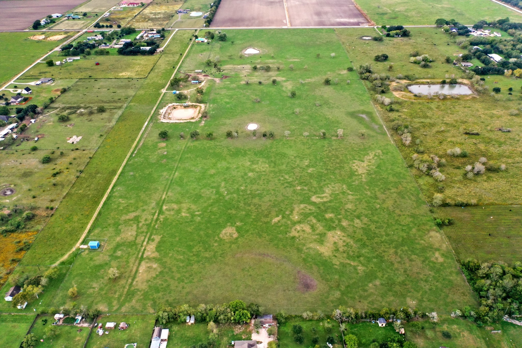 10507 Padon Road Needville, TX 77461 - Photo 4 of 48 a backyard of a multi story residential houses with yard