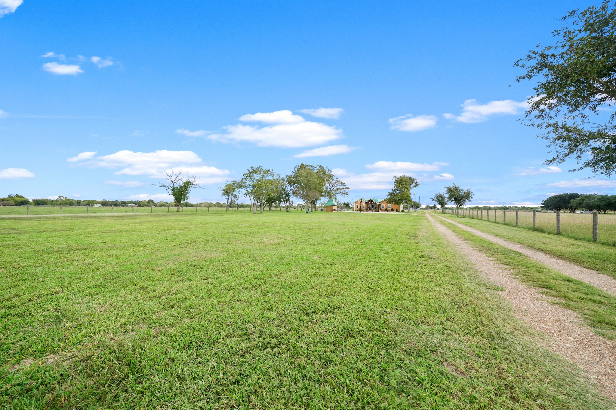 10507 Padon Road Needville, TX 77461 - Photo 6 of 48 a view of yard with swimming pool and green space