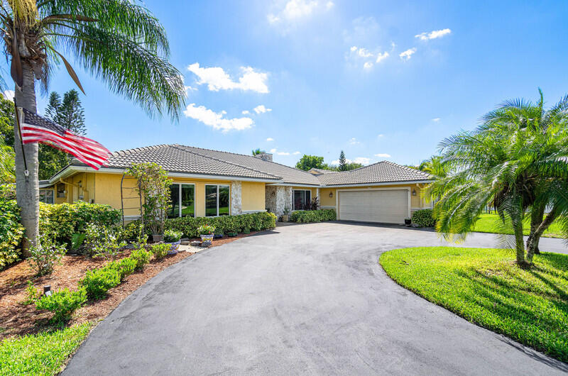 22299 Solitude Drive Boca Raton, FL 33428 - Photo 4 of 38 Front of Home