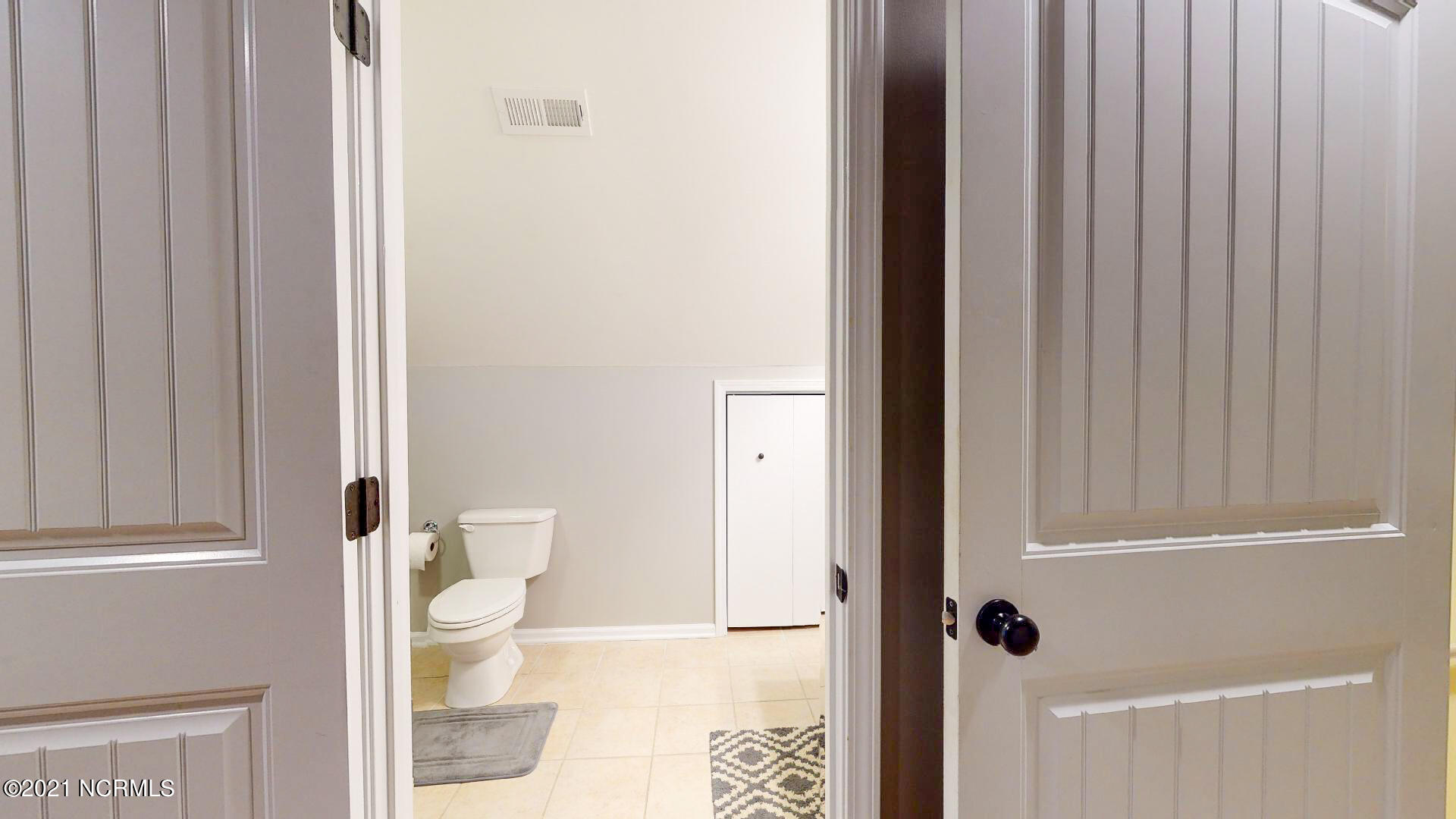 7034 Old Field Road Wilmington, NC 28411 - Photo 31 of 42 upstairs bathroom