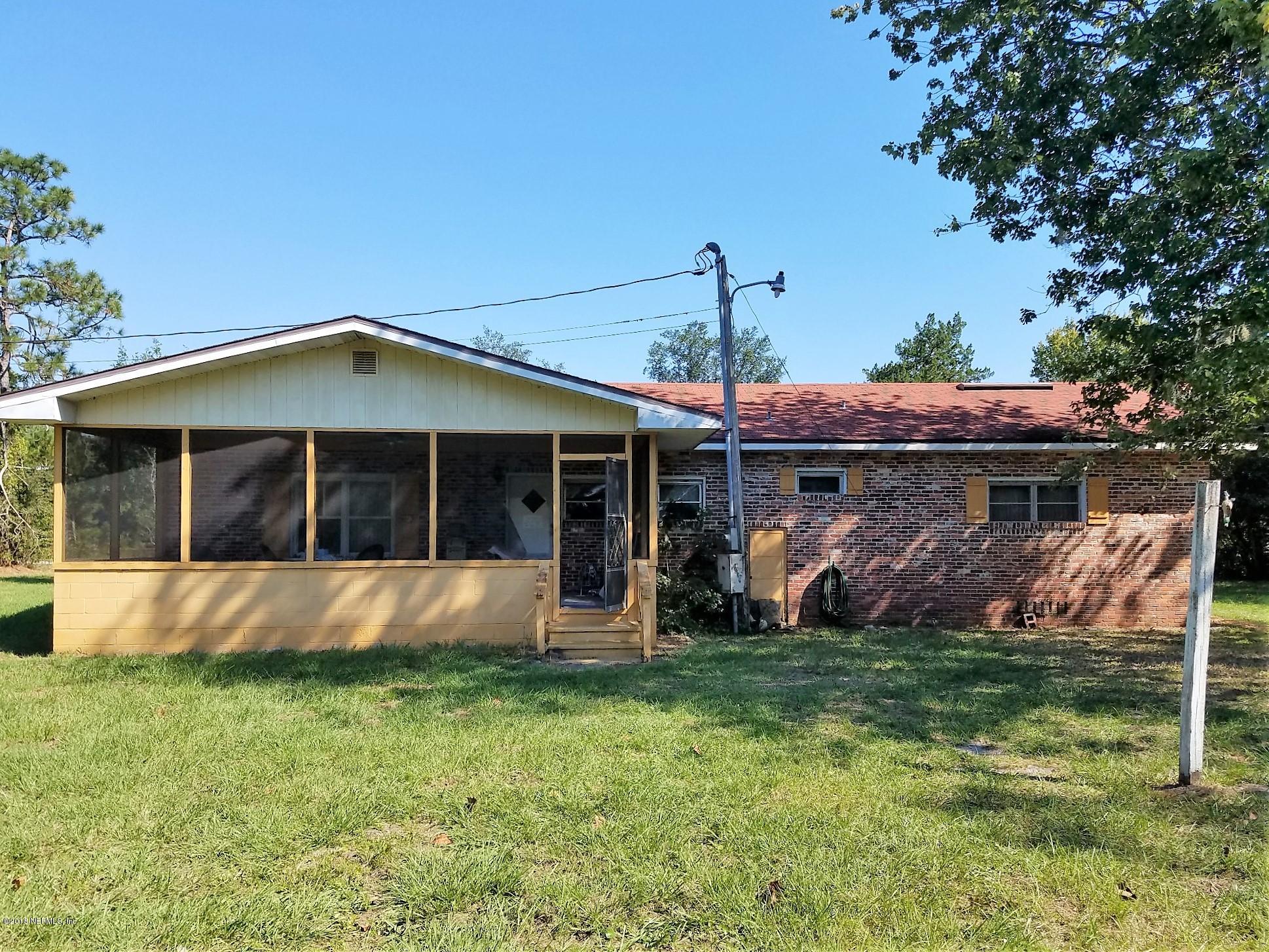 1510 Scott Road St. Johns, FL 32259 - Photo 3 of 4 a front view of a house with a yard