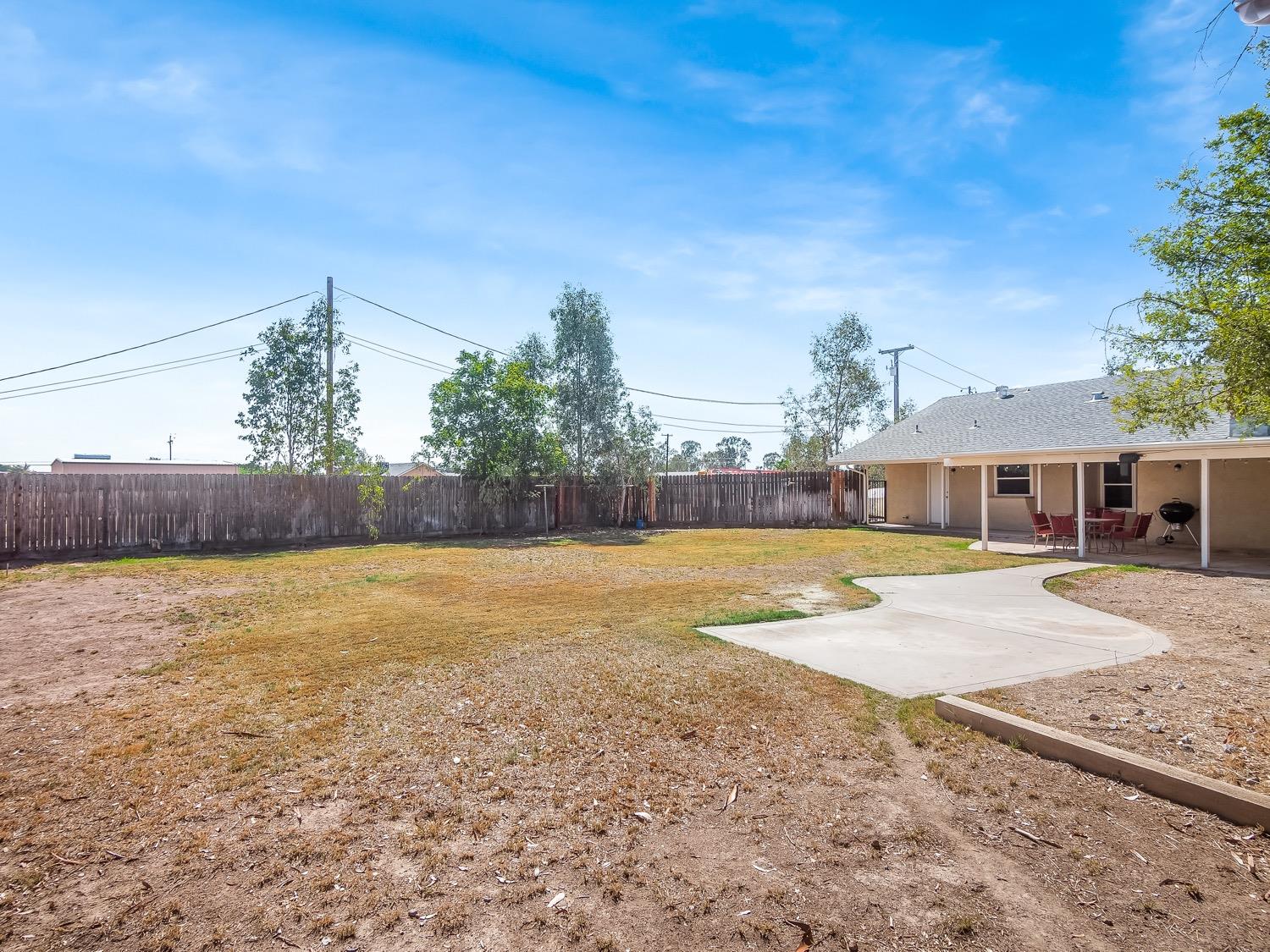 16181 Monreal Road Madera, CA 93636 - Photo 17 of 40 a view of a swimming pool and lounge chairs