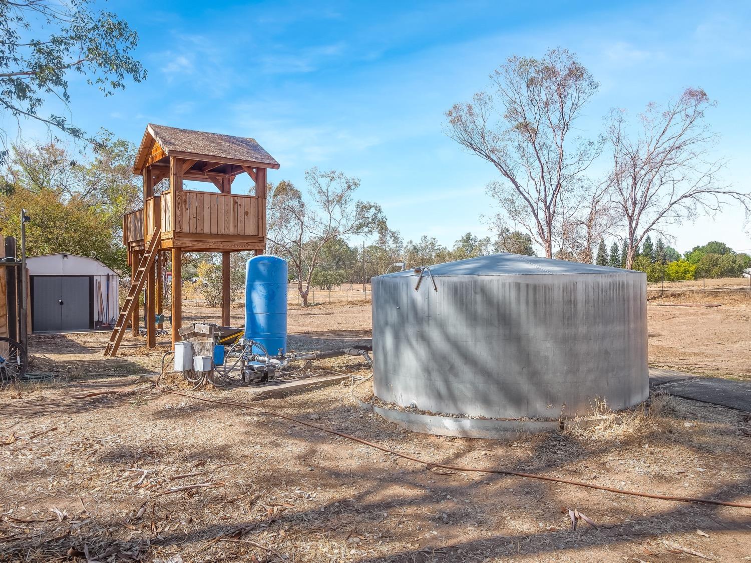 16181 Monreal Road Madera, CA 93636 - Photo 32 of 40 a front view of a house with street