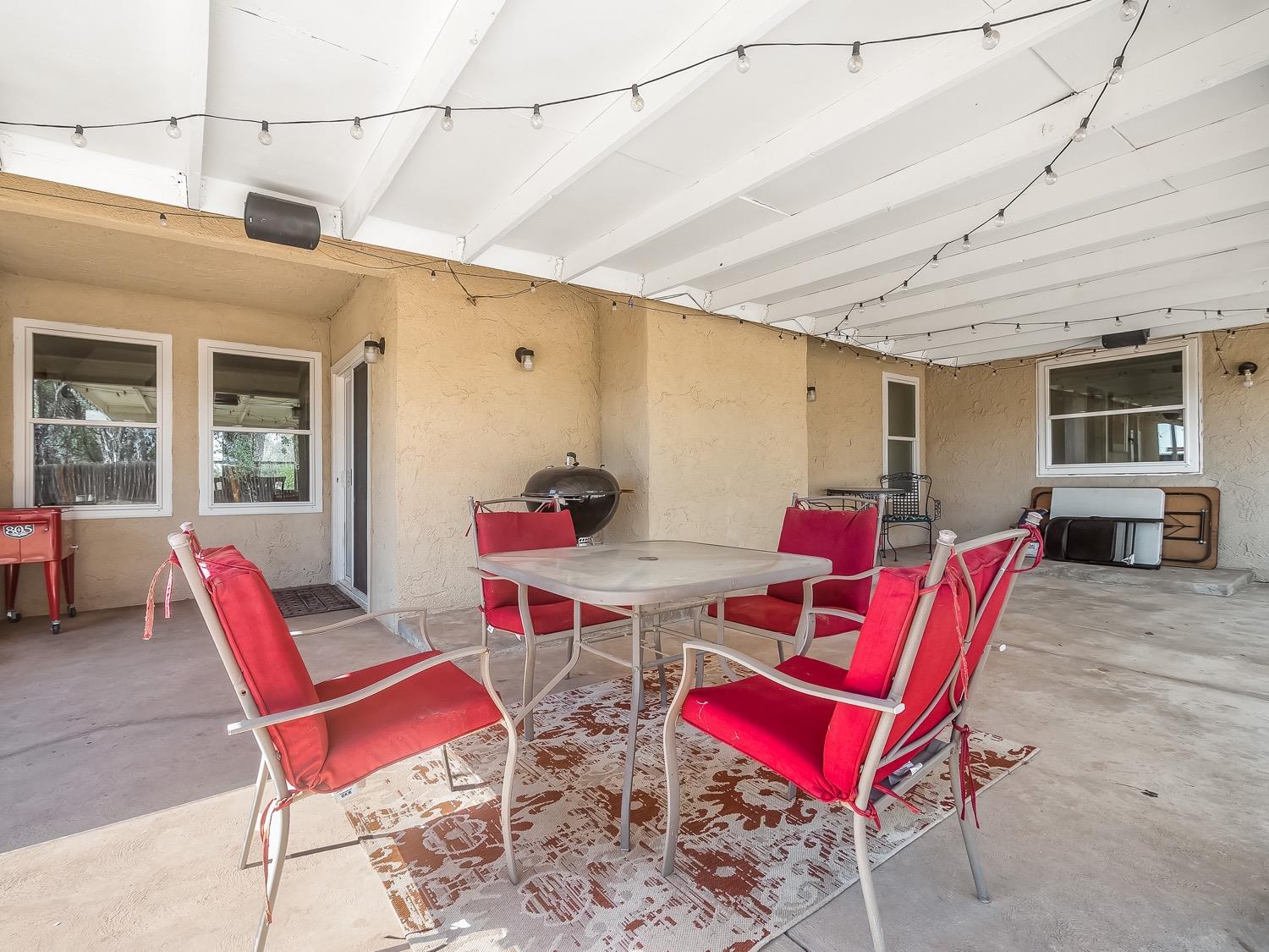 16181 Monreal Road Madera, CA 93636 - Photo 33 of 40 a view of a dining room with furniture