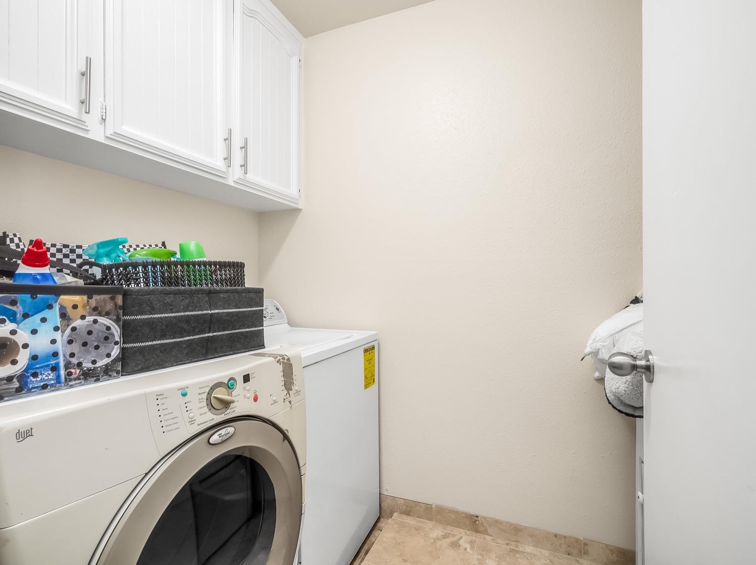 16181 Monreal Road Madera, CA 93636 - Photo 38 of 40 a utility room with dryer and washer