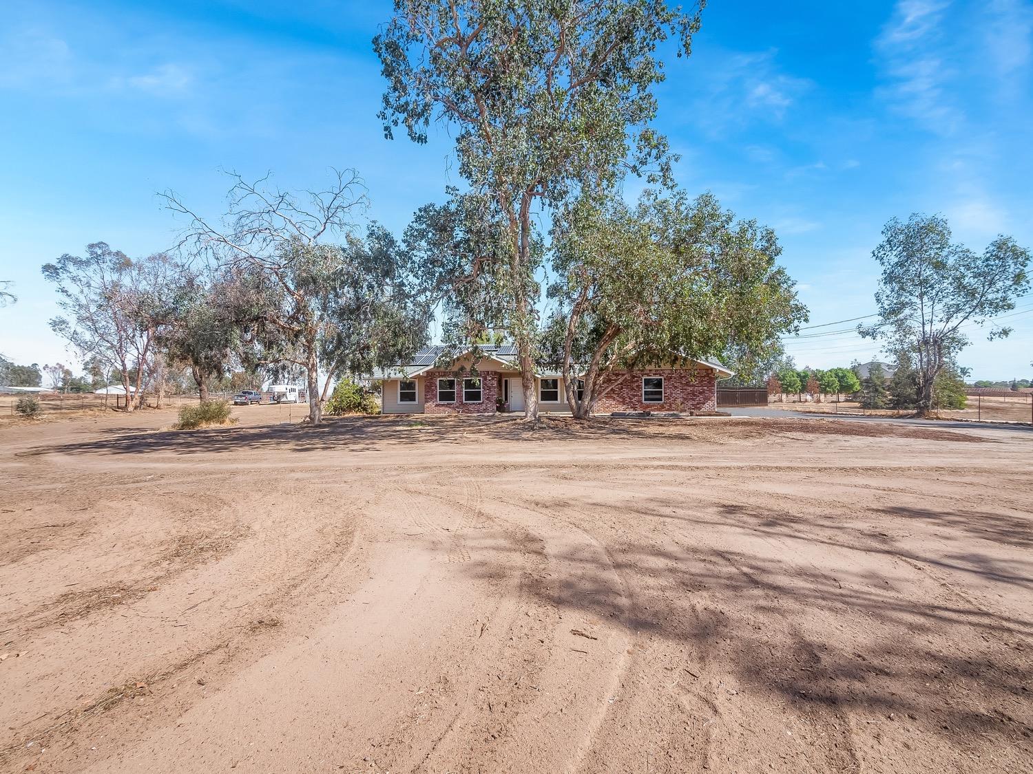 16181 Monreal Road Madera, CA 93636 - Photo 40 of 40 a view of road with large trees
