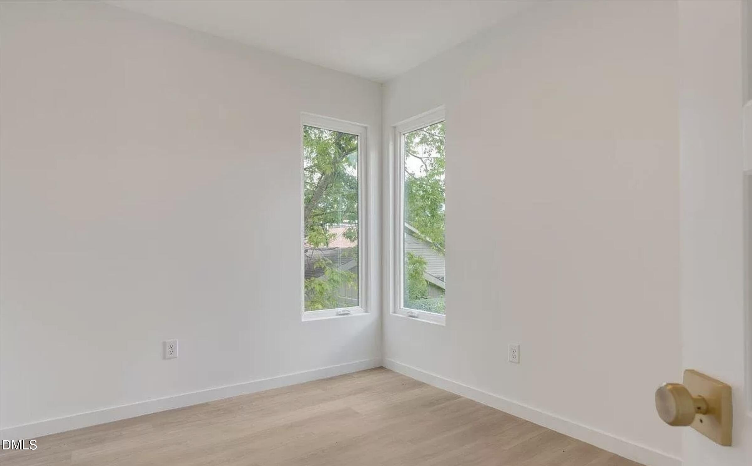 502 A Commonwealth Street Durham, NC 27703 - Photo 23 of 30 an empty room with a window