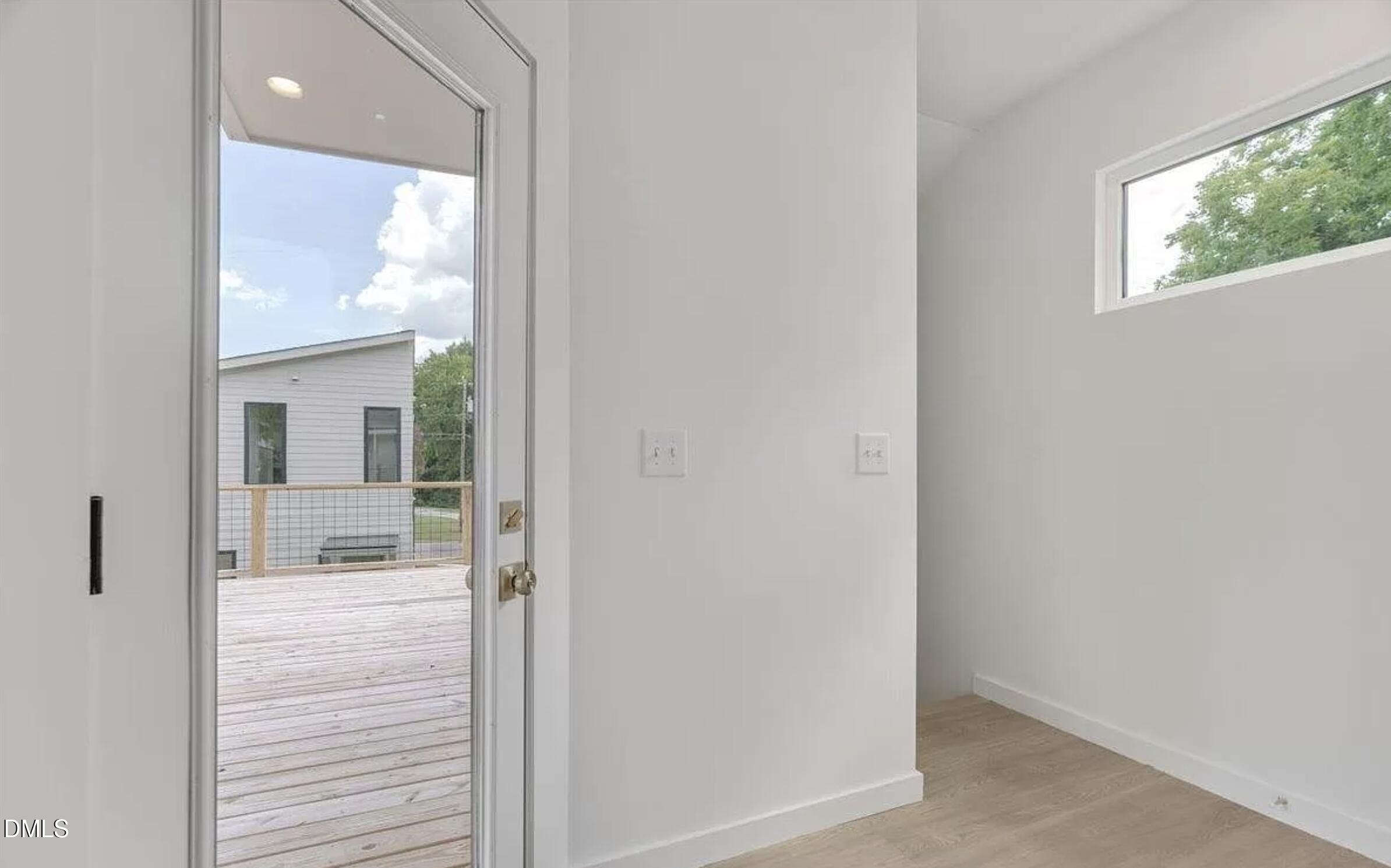 502 A Commonwealth Street Durham, NC 27703 - Photo 25 of 30 a bathroom with a glass door shower and a sink