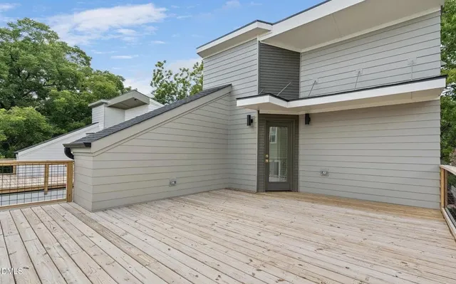 a view of a backyard of the house