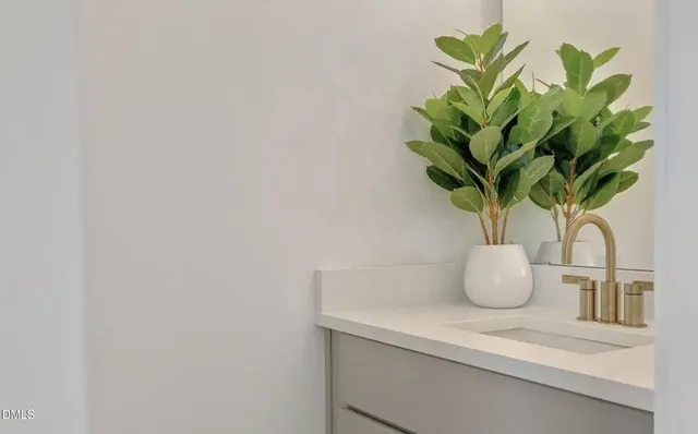 a vase of flowers sitting on a table