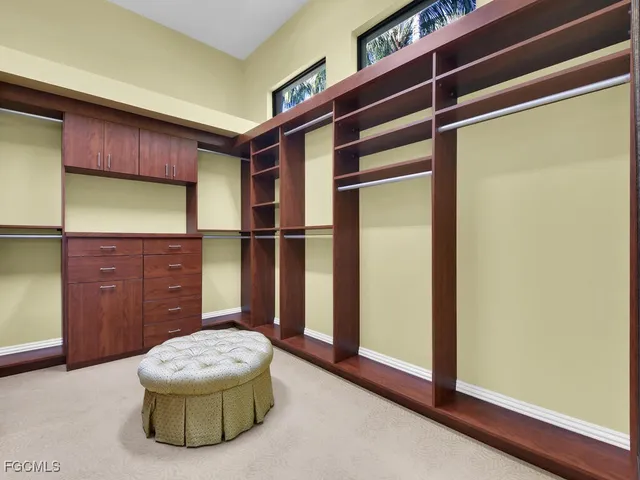 a house view with a sink and a mirror