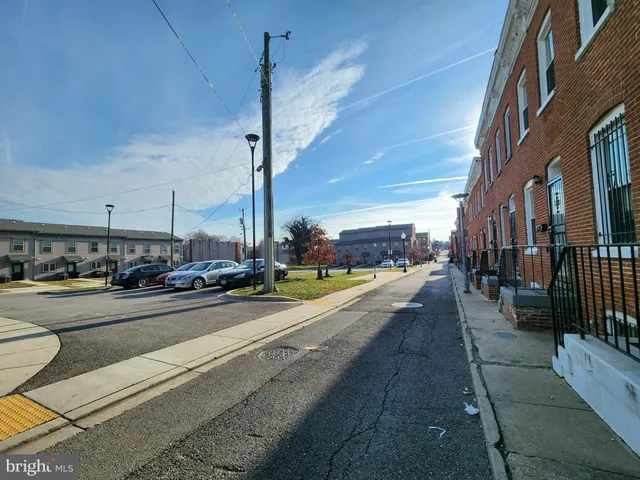 a view of a house with wooden stairs