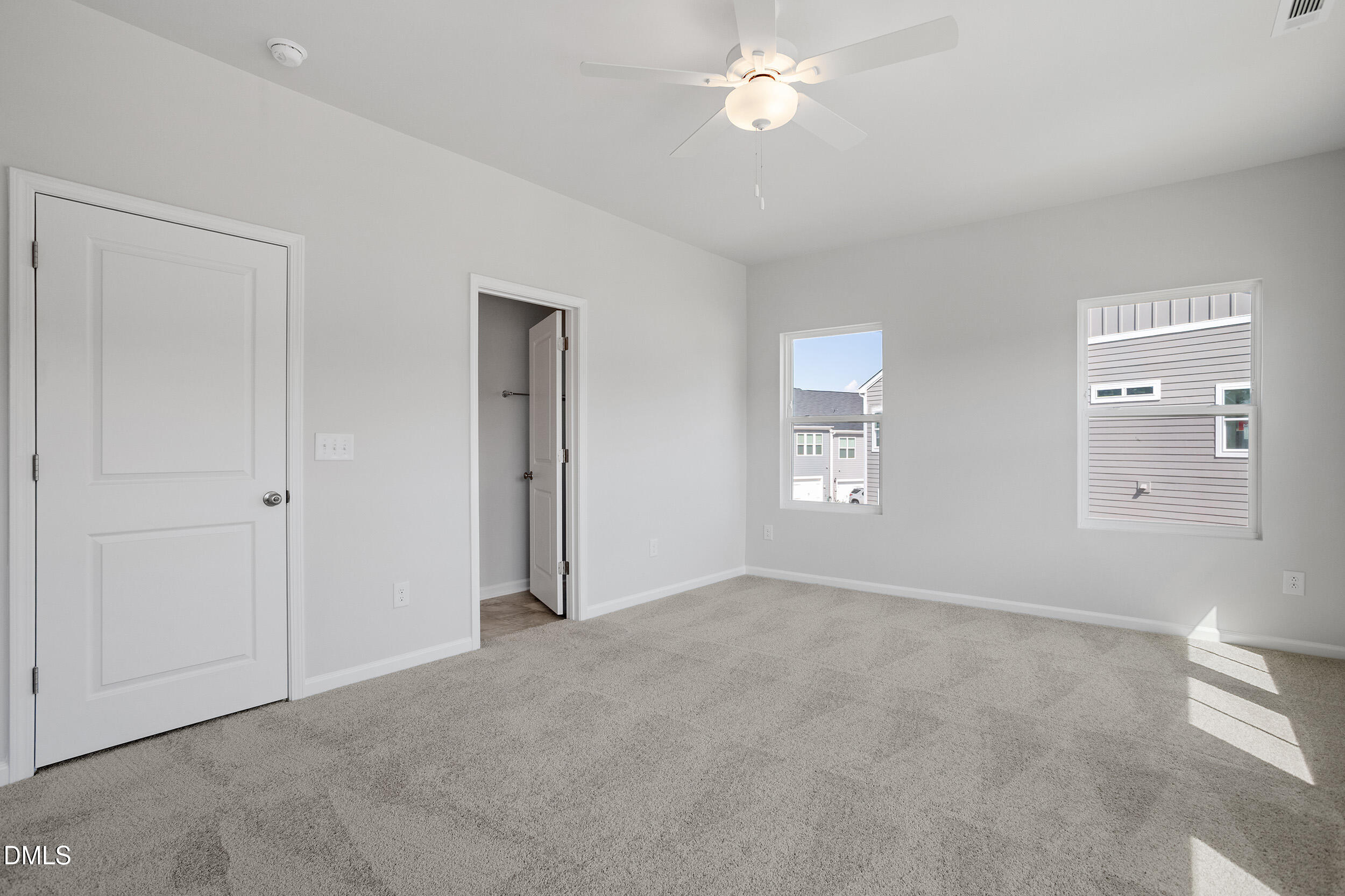 191 Powell Townes Way, Unit 319 Raleigh, NC 27603 - Photo 22 of 50 a view of an empty room with a window