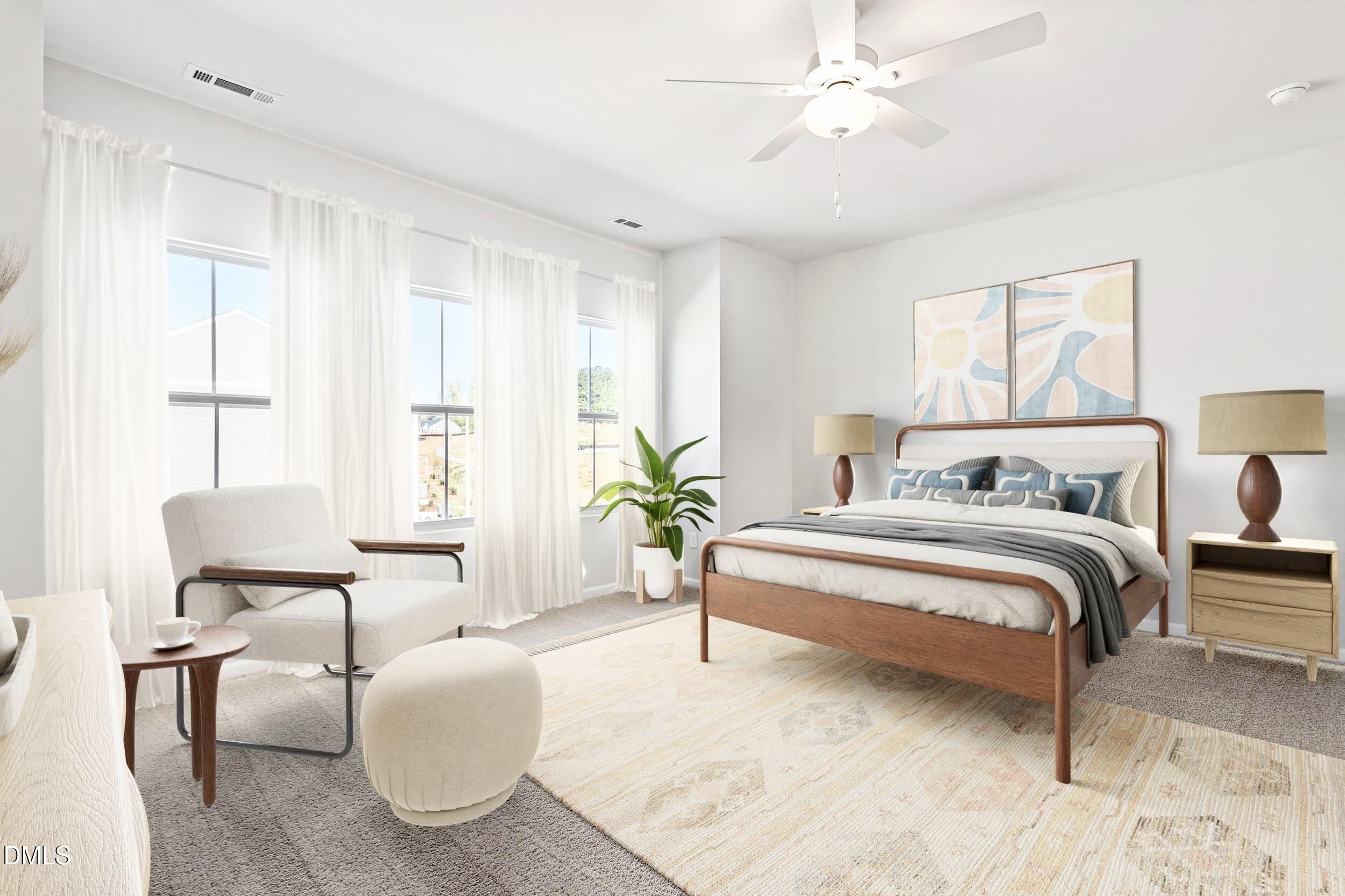 191 Powell Townes Way, Unit 319 Raleigh, NC 27603 - Photo 37 of 50 a spacious bedroom with a bed and a chandelier