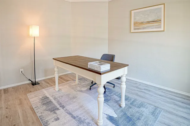 a view of a workspace with furniture