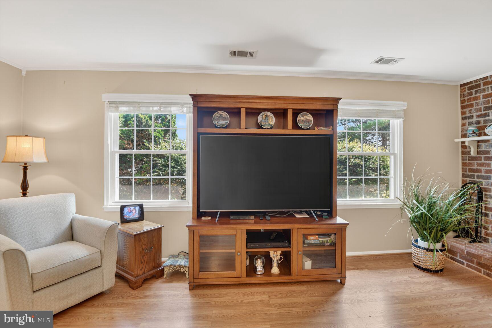 5382 View Point Court Sykesville, MD 21784 - Photo 13 of 32 a living room with furniture and a flat screen tv