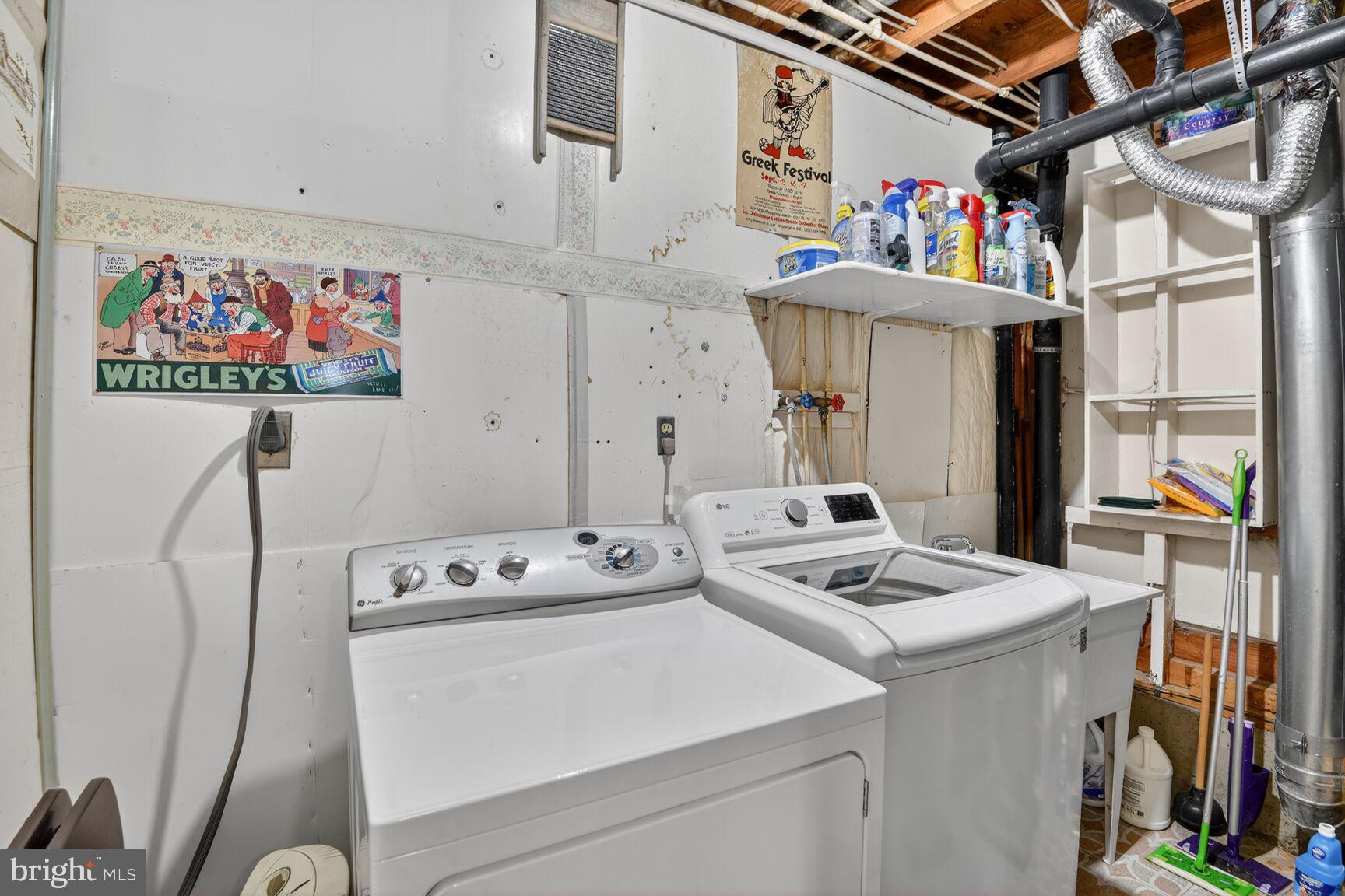 5382 View Point Court Sykesville, MD 21784 - Photo 16 of 32 a utility room with dryer washer and a refrigerator