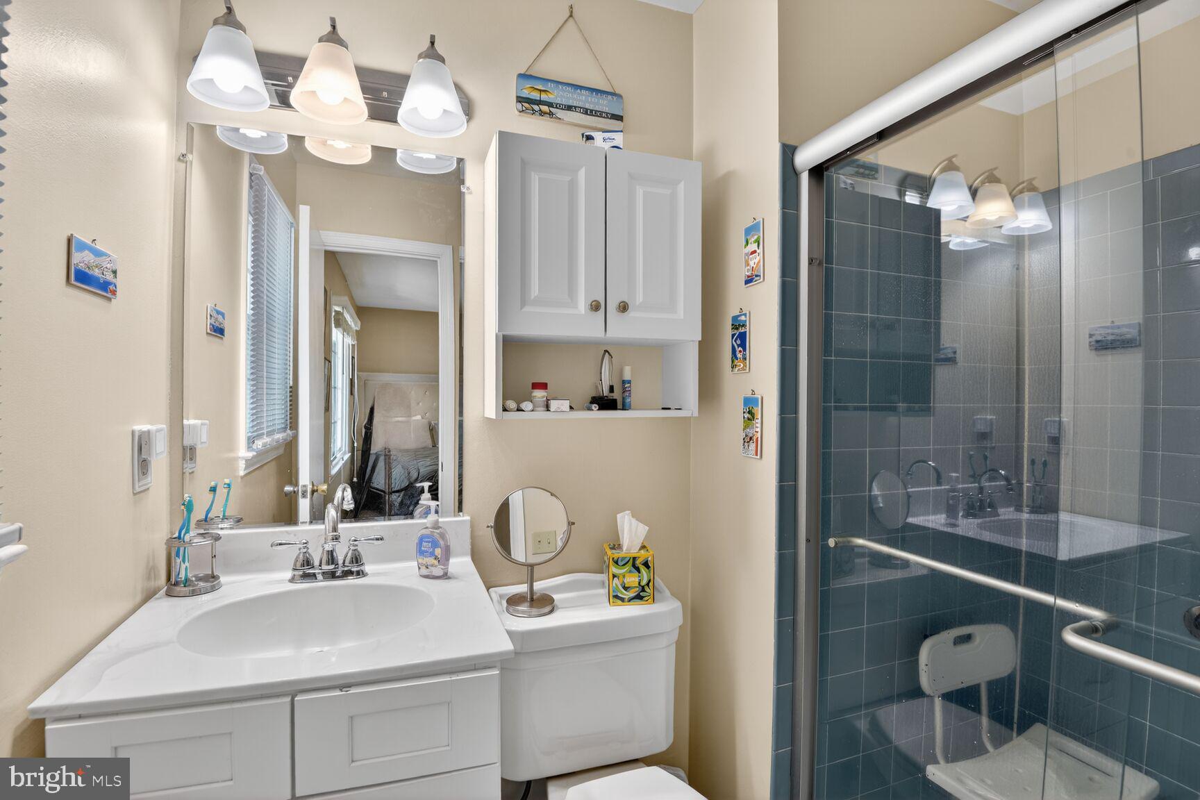5382 View Point Court Sykesville, MD 21784 - Photo 20 of 32 a bathroom with a sink vanity granite and a mirror