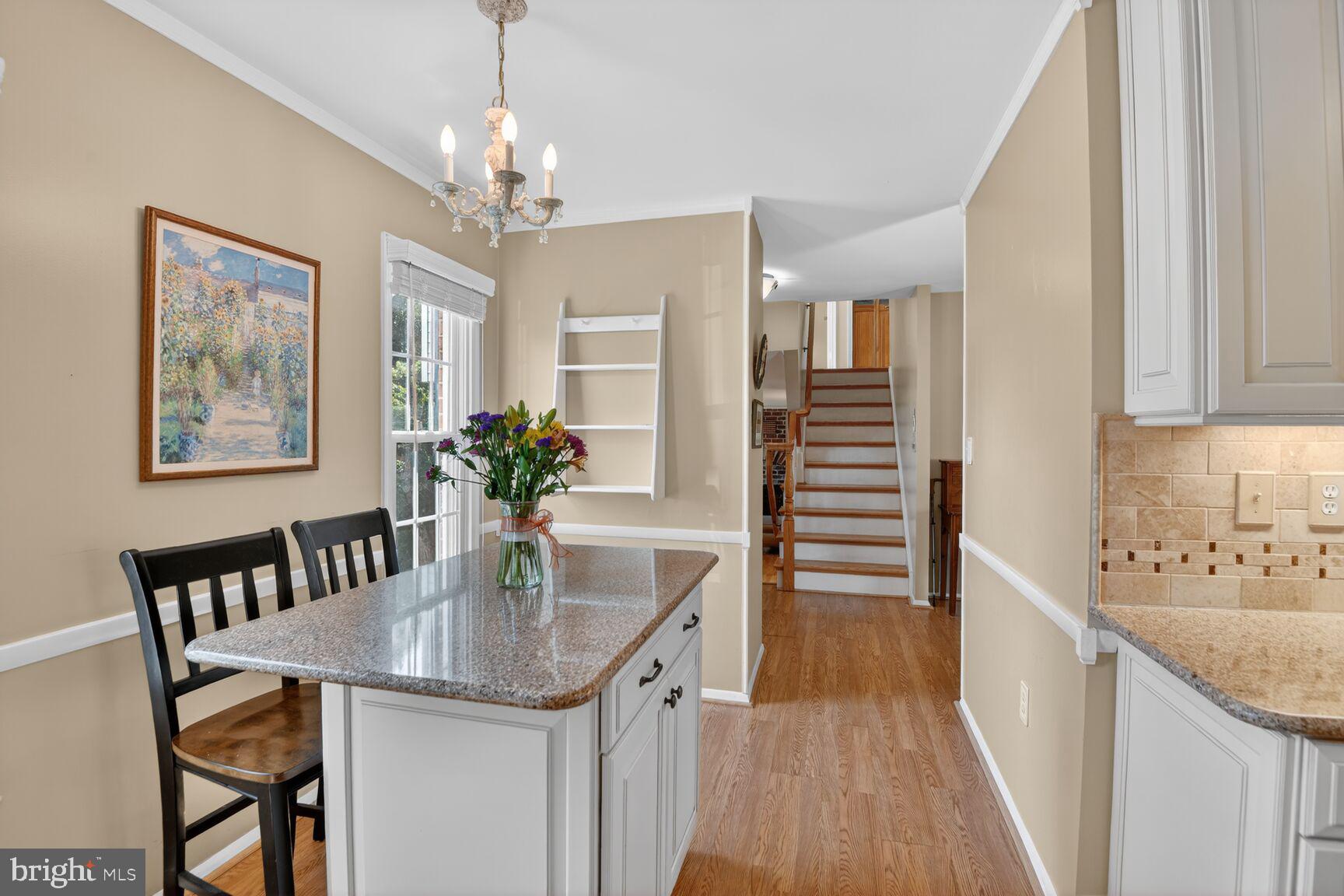 5382 View Point Court Sykesville, MD 21784 - Photo 2 of 32 a kitchen that has a table and chairs in it