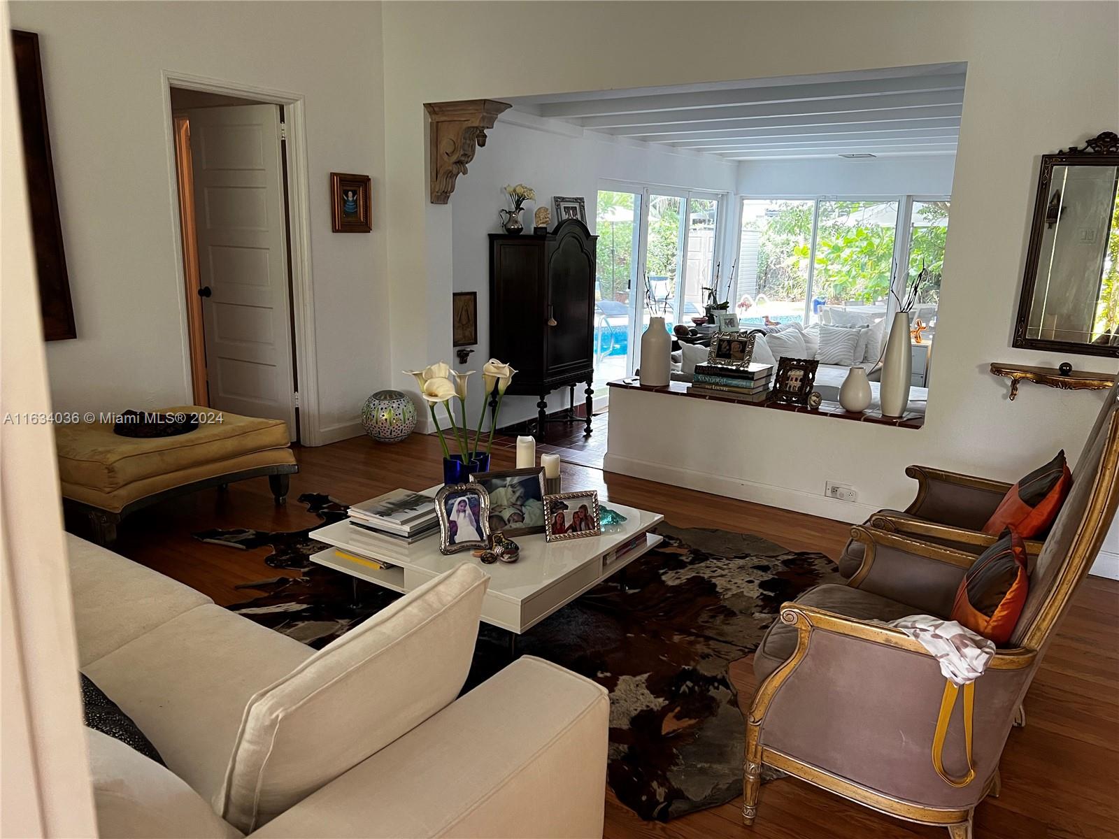 454 Southwest 25th Road Miami, FL 33129 - Photo 4 of 33 a room with furniture and a window