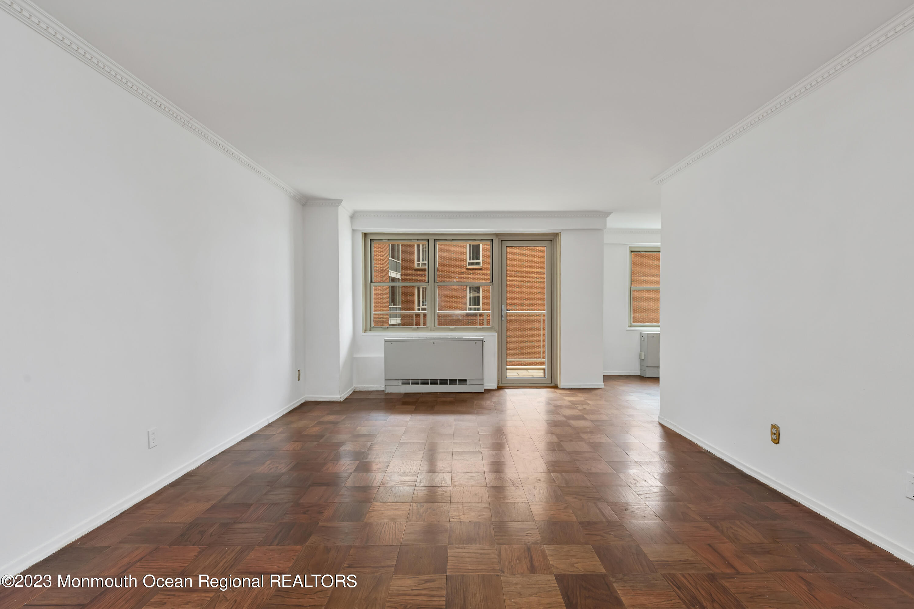 28 Riverside Avenue, Unit 2M Red Bank, NJ 07701 - Photo 8 of 31 a view of an empty room with a window