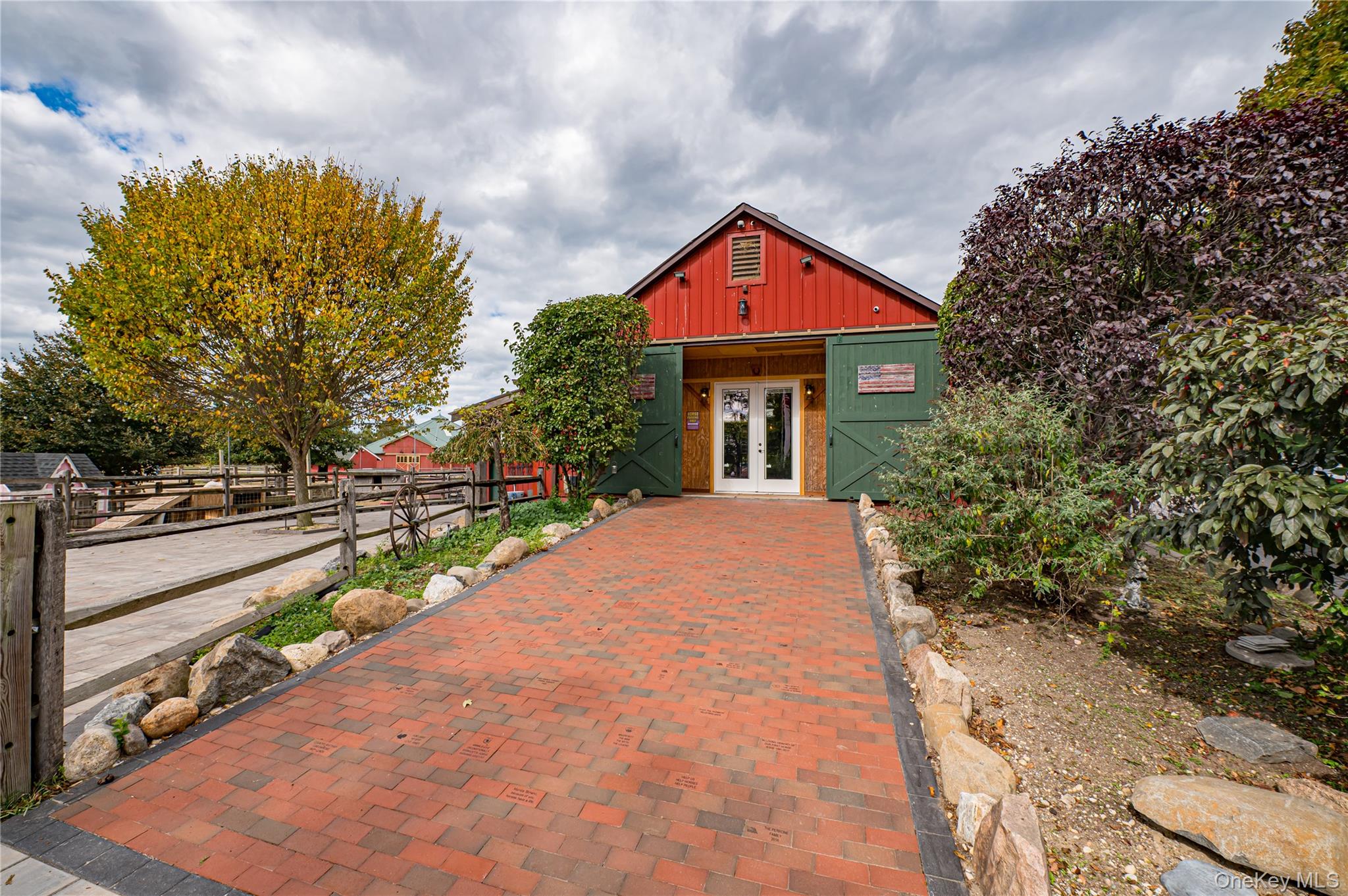 2746 Sound Avenue Riverhead, NY 11901 - Photo 13 of 44 a front view of a house with a yard