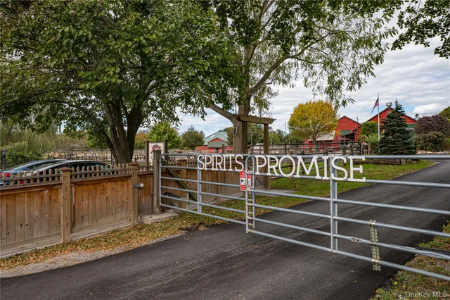 a view of a wooden deck and a yard