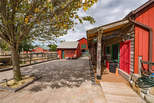a view of a street with a pole on a street