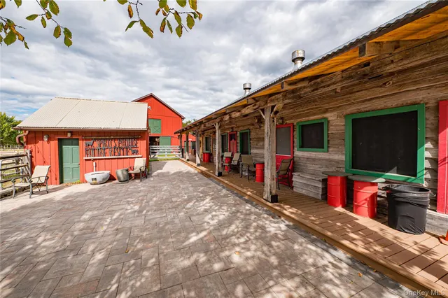 a view of the house with large windows