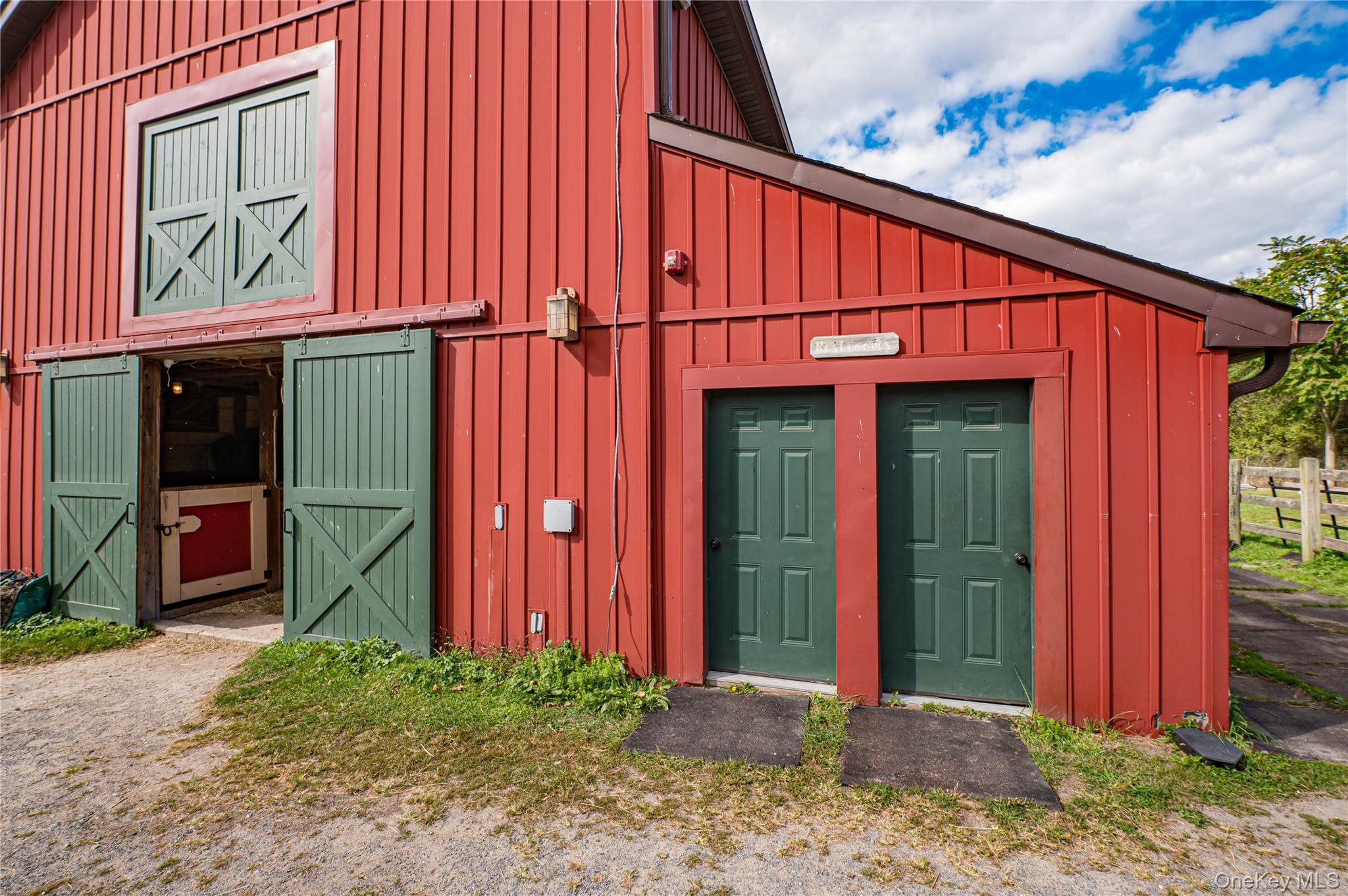 2746 Sound Avenue Riverhead, NY 11901 - Photo 36 of 44 a view of a entrance gate of the house