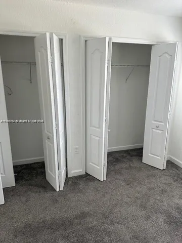 an empty room with a door