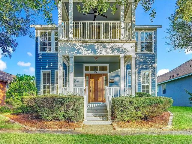 front view of a house with a yard
