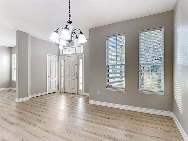 a view of a livingroom with wooden floor