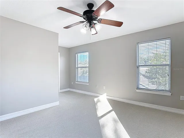 a bathroom with a sink double vanity and a mirror