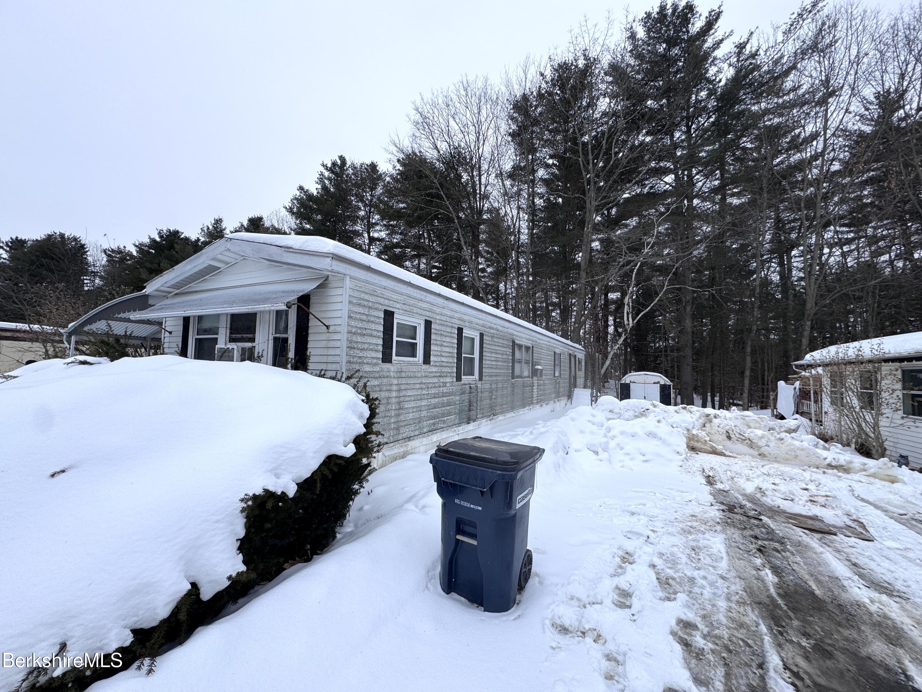 245 Cheshire Road, Unit 54 Pittsfield, MA 01201 - Photo 15 of 16 side view from neighbors driveway