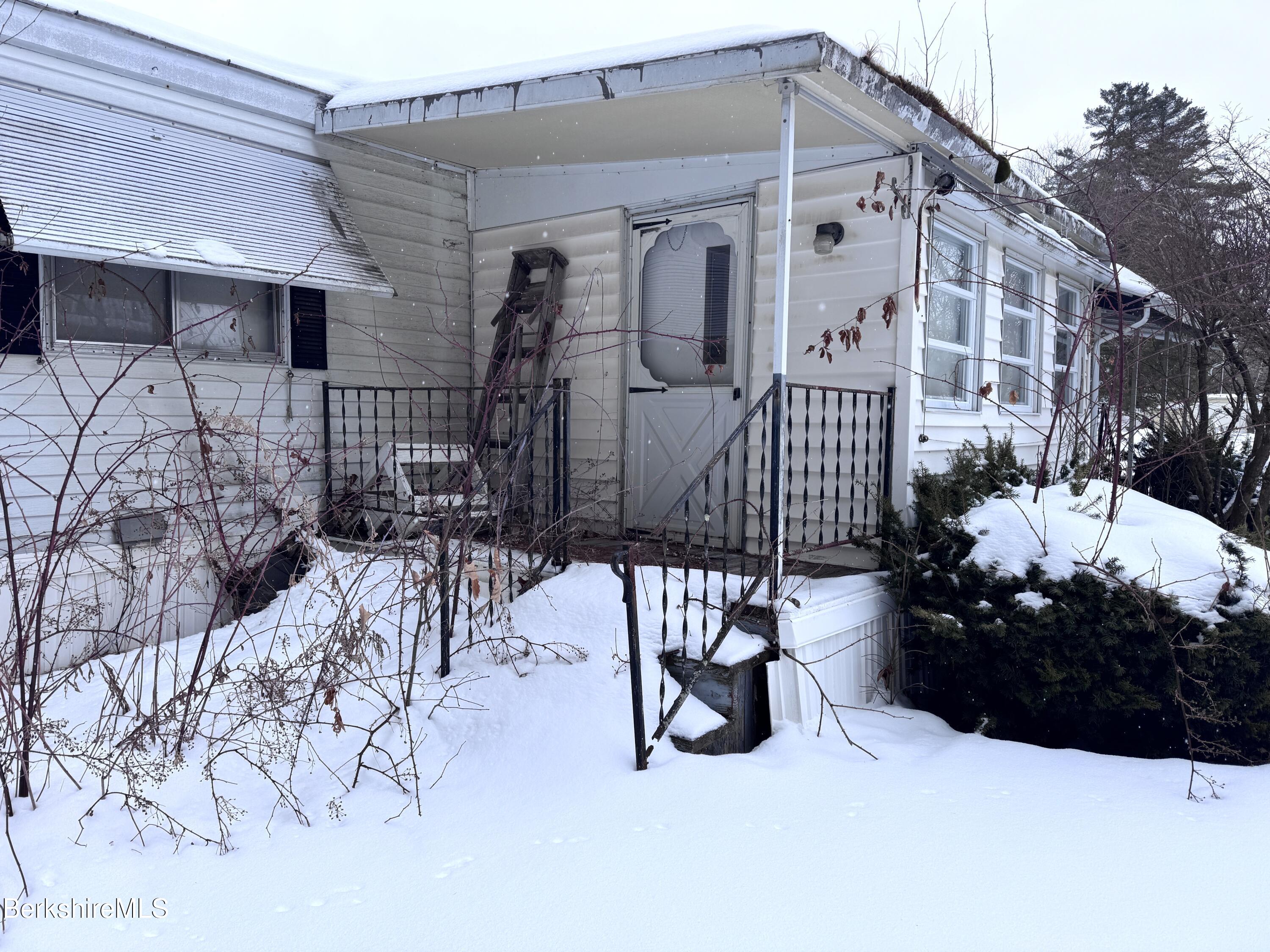 245 Cheshire Road, Unit 54 Pittsfield, MA 01201 - Photo 3 of 16 Side door