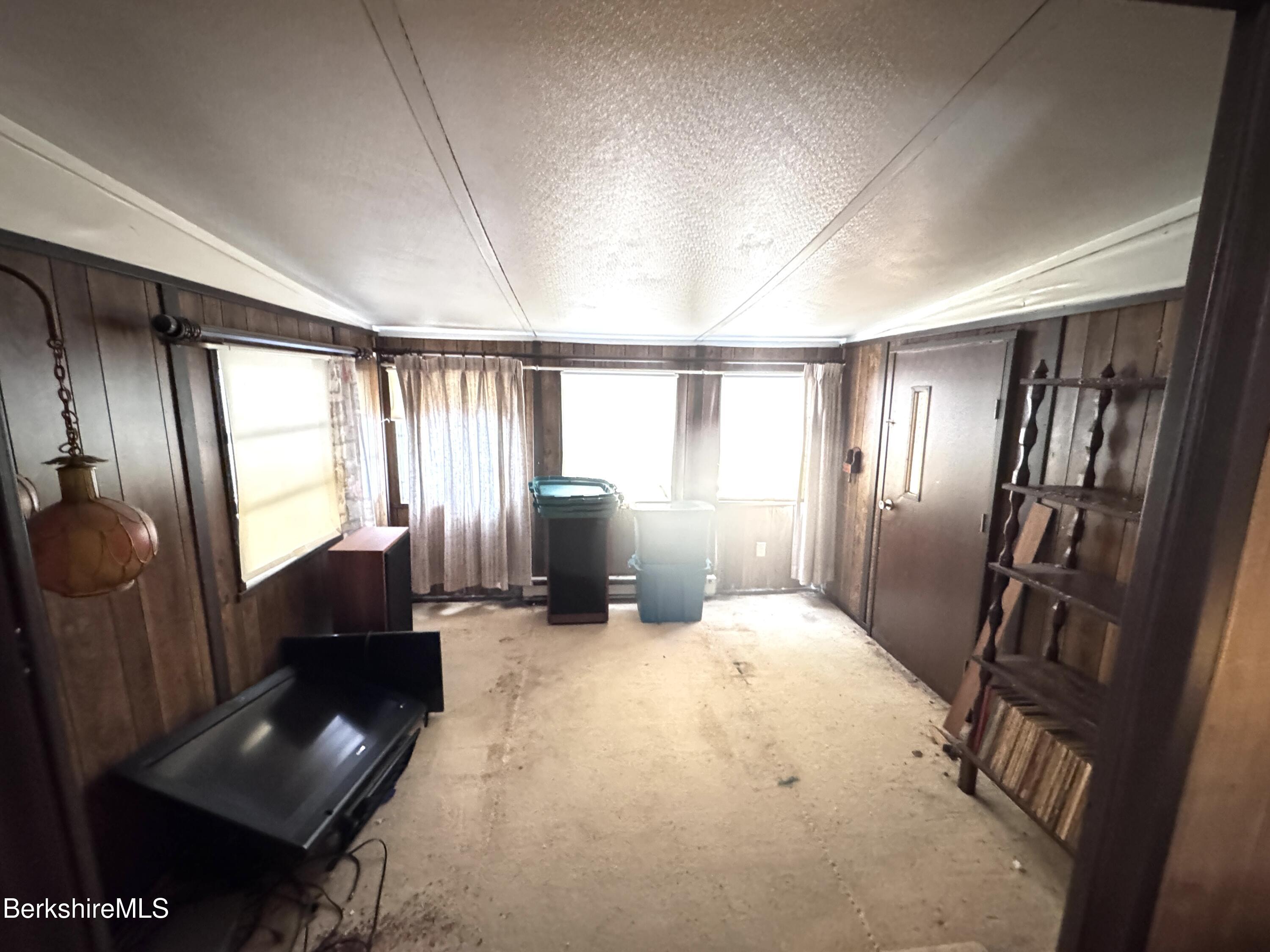 245 Cheshire Road, Unit 54 Pittsfield, MA 01201 - Photo 9 of 16 Den off living room