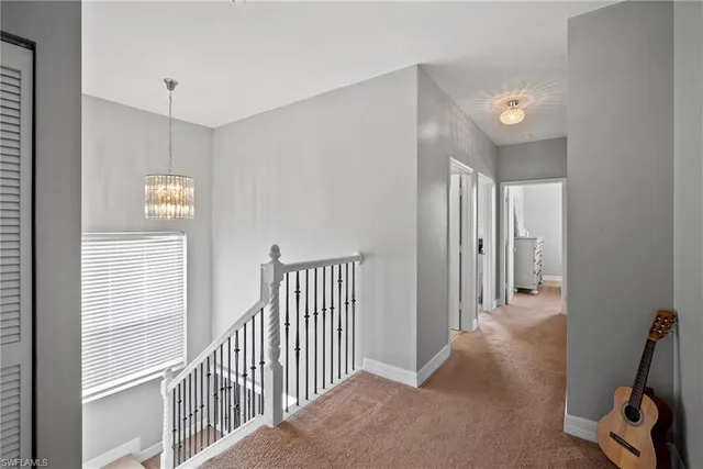 a view of a hallway with workspace