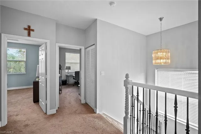 a view of a hallway with interior of house