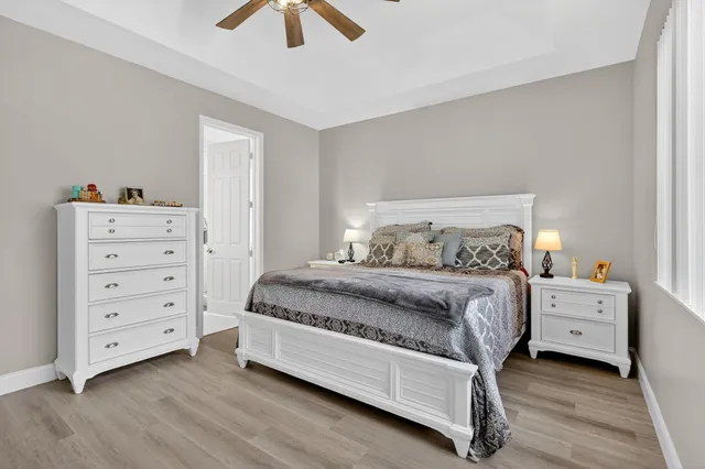 a bathroom with a sink vanity and mirror